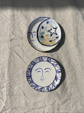 Load image into Gallery viewer, Ceramic plates titled Sun Plate and Moon Plate, painted by the artist Frances Costelloe.