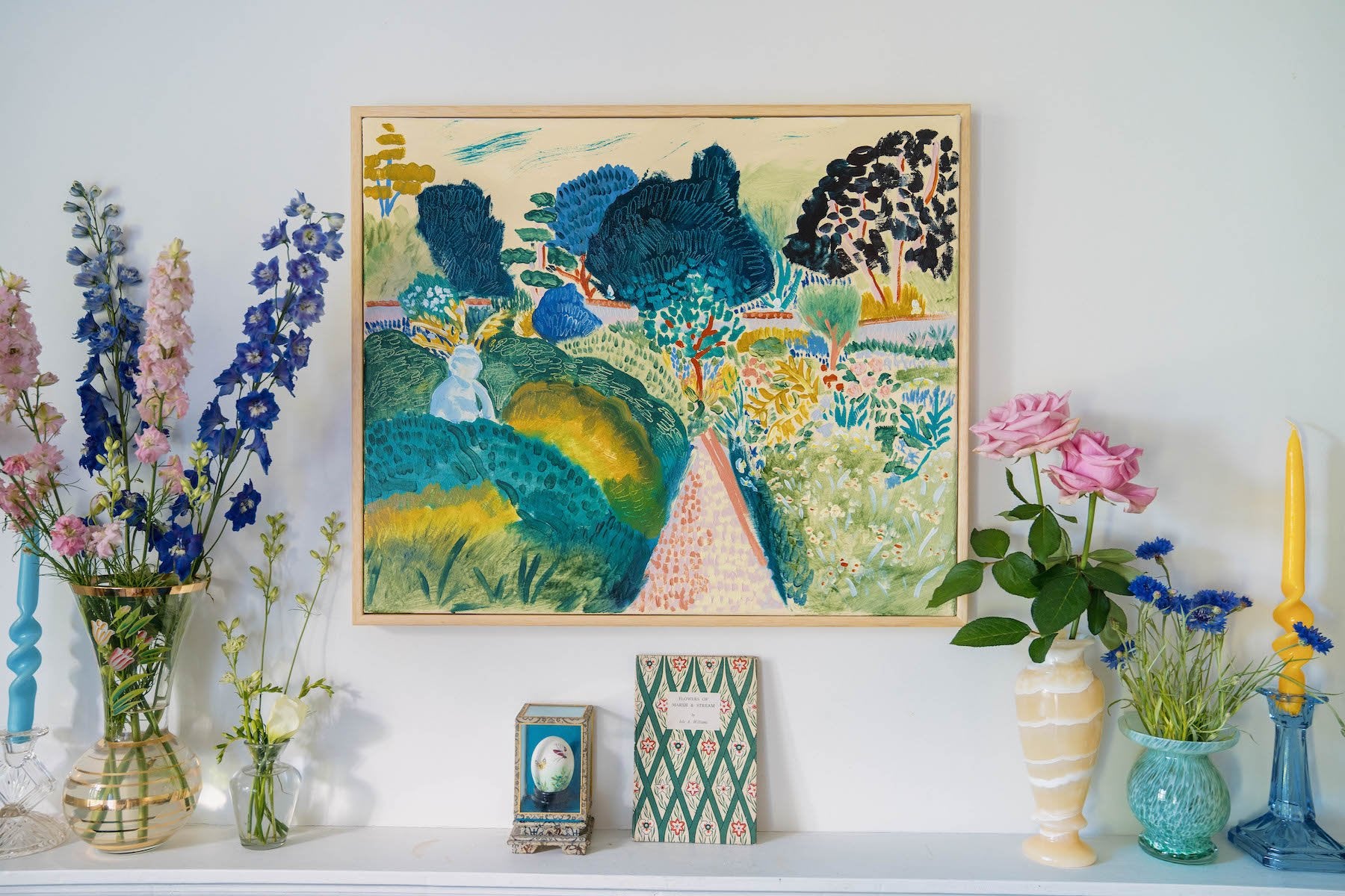 Bright and colourful original artwork on mantelpiece by Camilla Perkins.