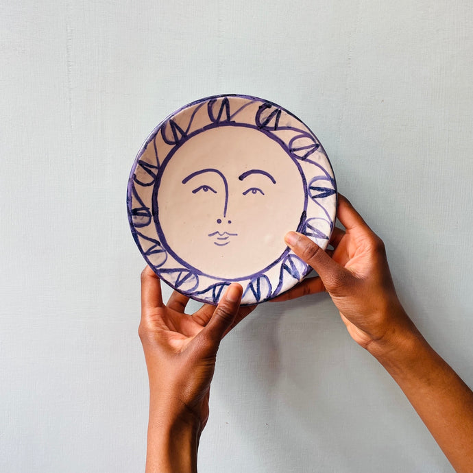 Playfully designed ceramic bowl painted by the talented artist Frances Costelloe titled Sun Plate.