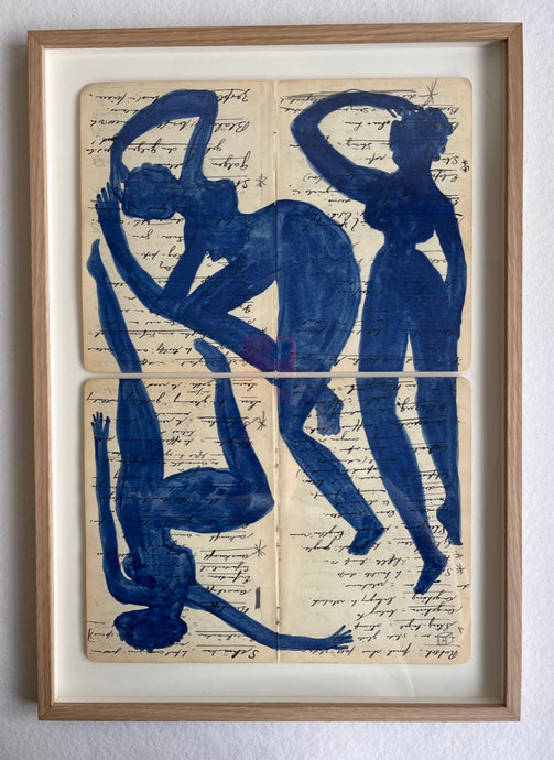 Three blue figures puzzle on English German notebook (Framed)