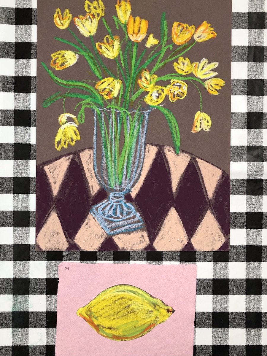 Yellow tulips on harlequin table