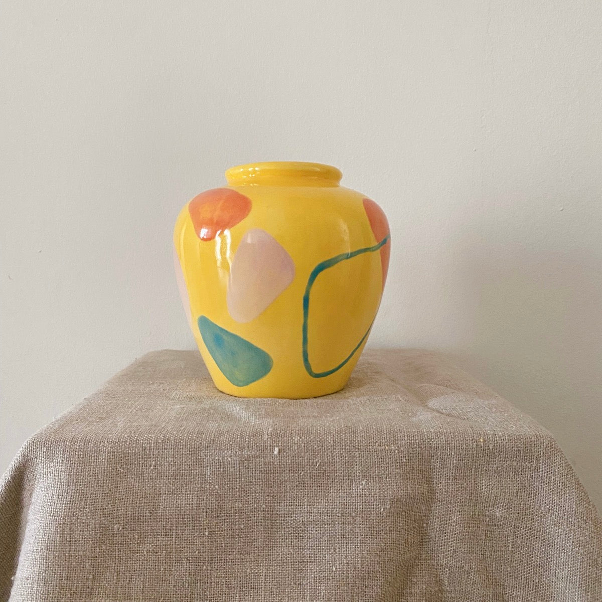 Yellow round-shaped pot